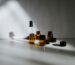 Curated lineup of professional post-transplant hair recovery products in amber bottles