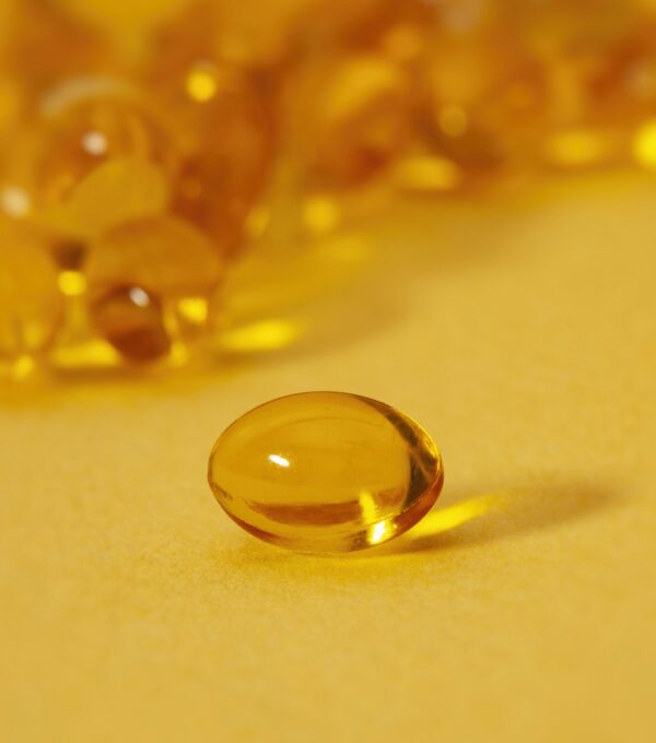 Hair growth supplement capsules featuring biotin and vitamins for hair recovery