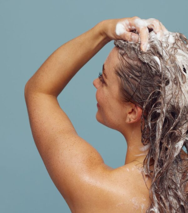 Gentle hair washing with shampoo as part of post-transplant aftercare
